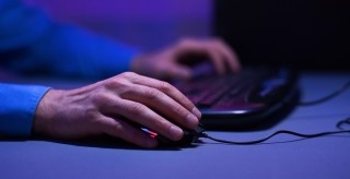 hands on a mouse and keyboard