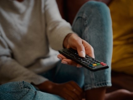 technology woman hand remote